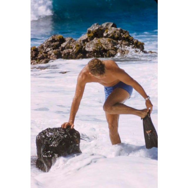 Hawaiian Scenes by Toni Frissell A diver prepares in the surf, Hawaii, 1957. (Photo by Toni Frissell) 20x16" inches /...