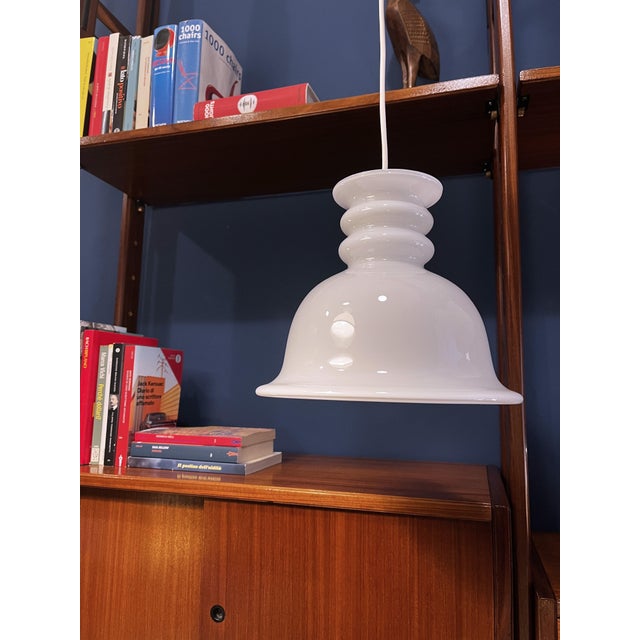 The chandelier is in perfect condition, the electrical cable has been replaced. Elegant white Danish glass. I have...