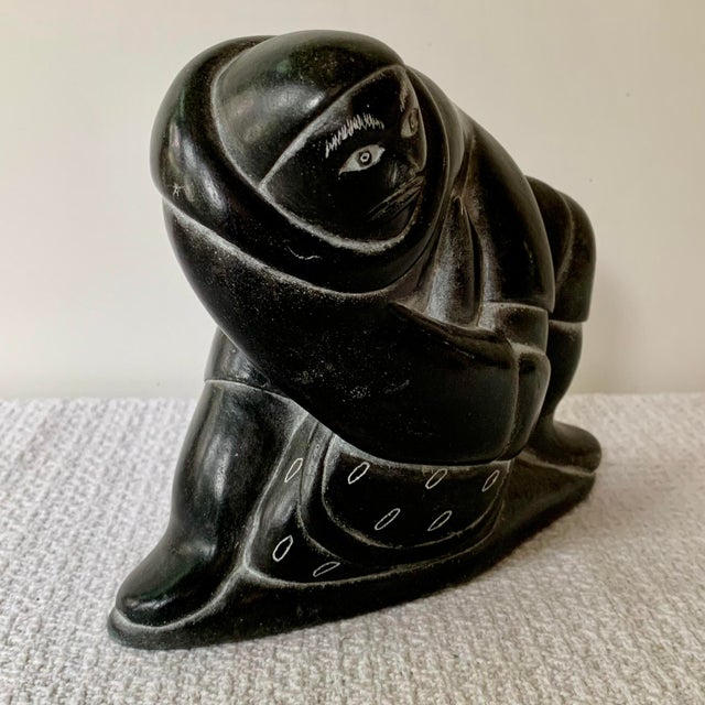 Stone Inuit Soapstone Carving by Lucassie Amm – Signed - Kneeling Inuk Figure For Sale - Image 7 of 18