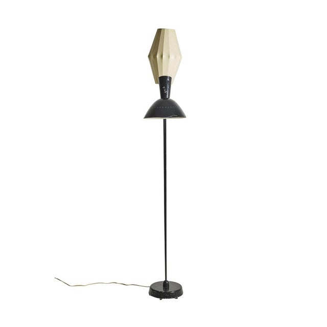 A striking two-arm floor lamp designed by Hans Bergström for Ateljé Lyktan, Sweden, circa 1950s. An exceptional example...