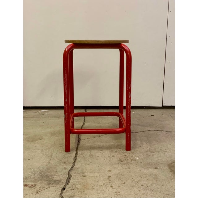 Vintage danish Industrial Stool red Metal Tube, and Wooden Seat