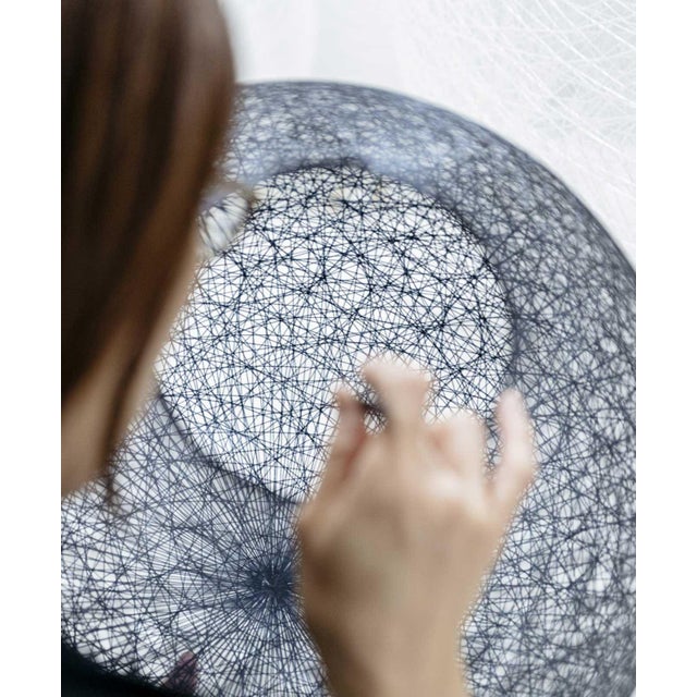The spun thread design is reminiscent of a cocoon and gives off a soft light that is enhanced by the double and triple...