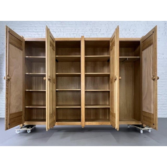 Discover the timeless elegance of this wardrobe by the renowned duo Guillerme and Chambron: a masterpiece of French design...