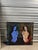 This striking large-format artwork features a dual portrait of two women, one rendered in cool, ethereal blue tones and...