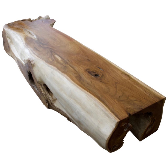 Reclaimed teak wood coffee table or bench. We polished the top section and flat sections on the side and bleached the rest...