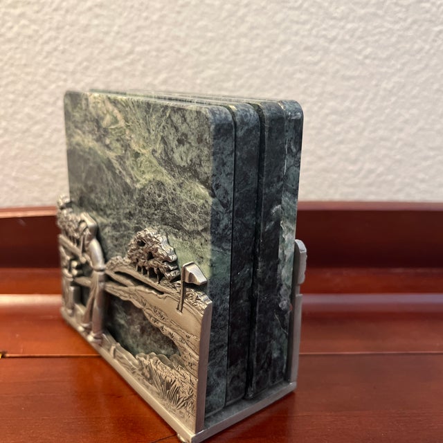 vintage pewter golf coaster holder with green marble coasters. The holder features detailed golf course and ball...