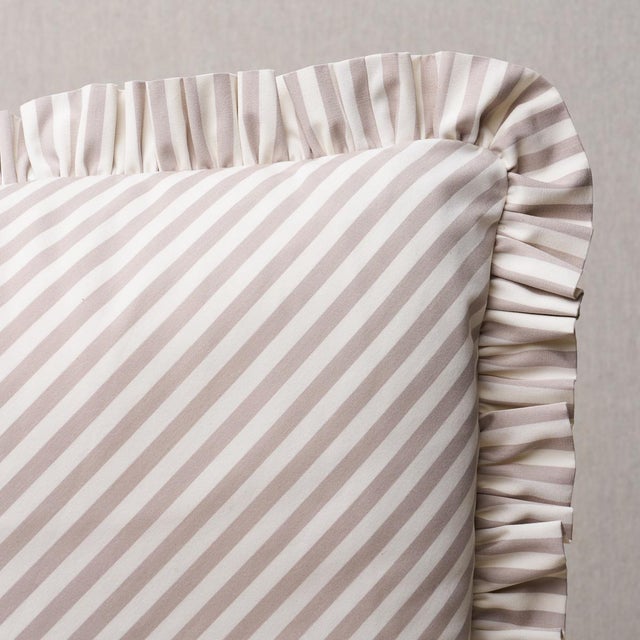 This pillow features Brigitte Stripe with a 1.5" ruffle finish. The perfect thin stripe, not too casual and not too...