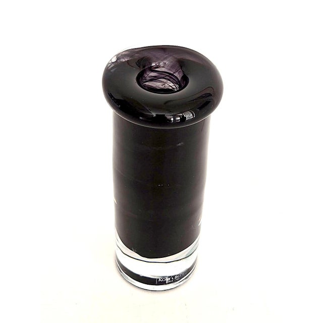 Offered is a heavy art glass candlestick designed by Anna Ehrner for Kosta Boda in the 1970s. It features a swirled ribbon...