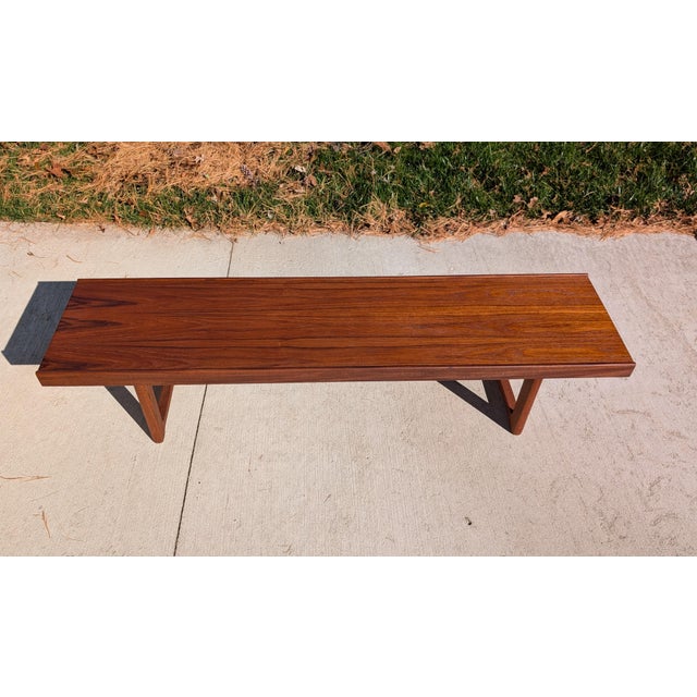 Vintage bench by Torbjørn Afdal for Bruksbo, Norway, circa 1960s. Solid teak legs and legs and skirts, nice teak veneer...