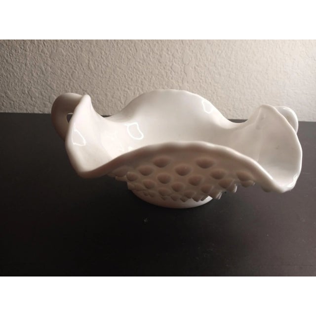 This is a vintage 1940s Fenton Milk Glass Hobnail Dual Handle 7" Candy Bowl. Procured at auction BOX 11