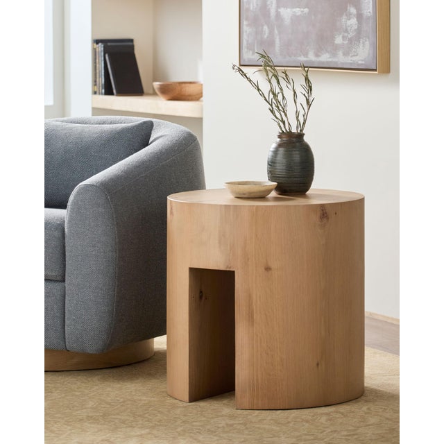 Elevate your living space with the Whittier End Table, a stunning embodiment of minimalist modern design. Crafted from...