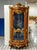 Elevate your home with the grandeur of this magnificent French Louis XV display cabinet, an extraordinary statement piece...