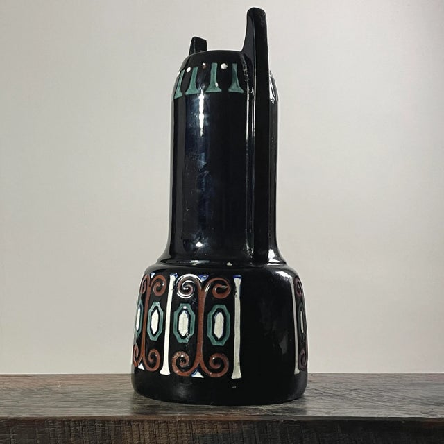 Antique Austrian Art Nouveau Jugendstil “Osiris” Hand Painted Ceramic Vase, Stamped. Hand painted black ceramic vase with...