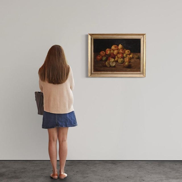 An elegant 20th-century French painting. Oil on board painting depicting a splendid still life with autumn fruits. The...