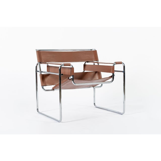 This vintage mid-century modern brown B3 Wassily arm chair designed by Marcel Breuer was manufactured by Gavina circa...