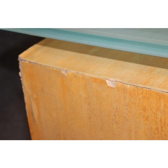 Sleek sideboard with frosted glass top and metal legs. Comes out of Vladimir Kagan's workshop!