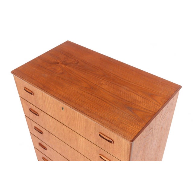 Origin: Denmark Designer: Arne Vodder Manufacturer: Unknown Era: 1950s Materials: Teak Measurements: 29.5" wide x 17" deep...