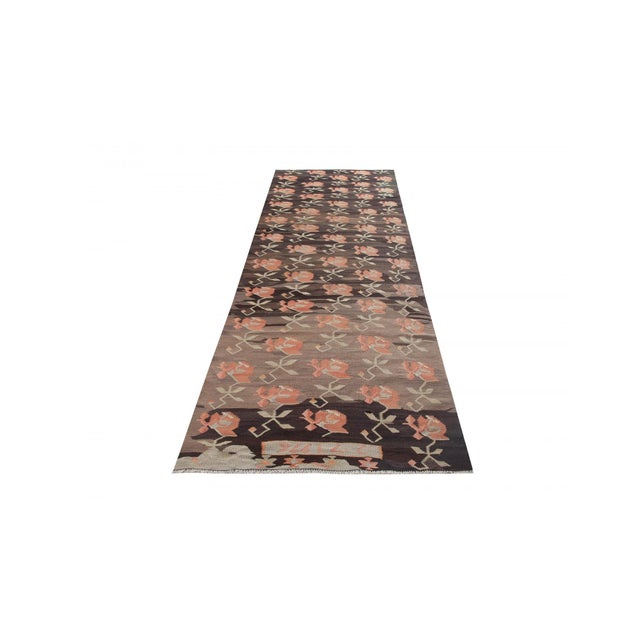 Vintage handwoven decorative kilim rug from Kars region of Turkey. Approximately 50-60 years old. In very good condition.