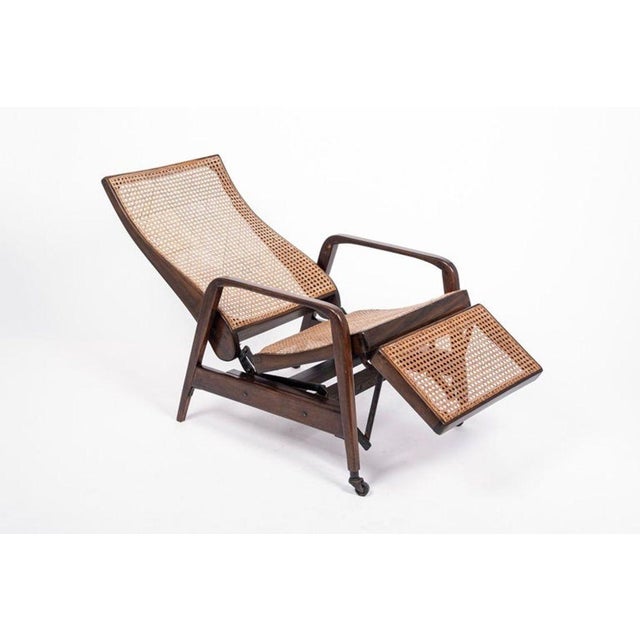 This unique antique mechanical recliner lounge chair was made in the early 20th century in Brazil. This exceptional chair...