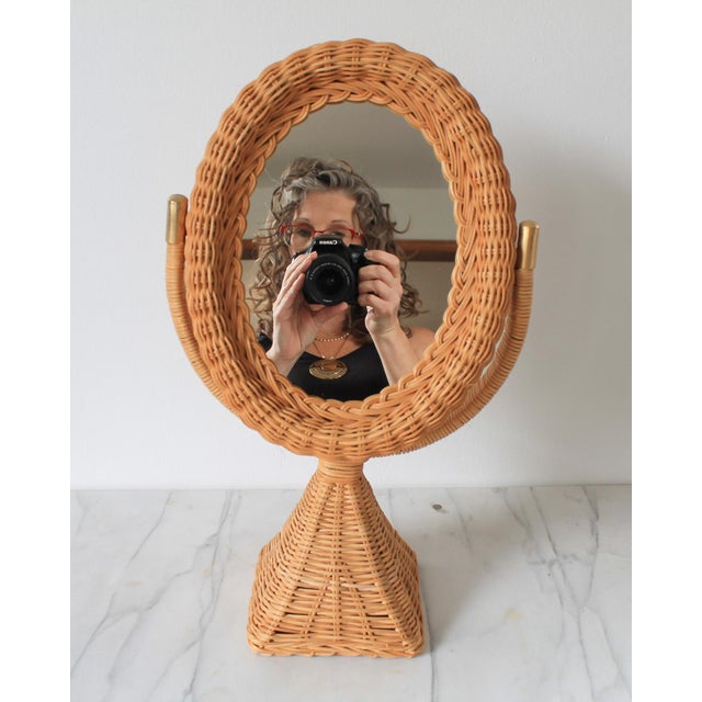 Vintage wicker rattan oval vanity mirror. No makers mark. Some very small/light scratches to mirror.