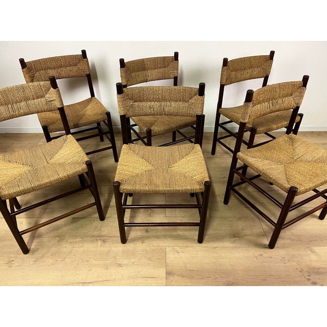 Set of 6 wooden chairs with rope seats, model LS4/B, designed by Tito Agnoli, Italian-made in the 1960s. The chairs have...