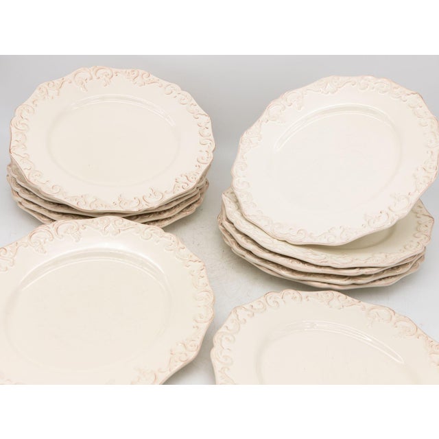Originally purchased from Anthropologie in 2007, this charming set of 12 oval stoneware plates showcases timeless...