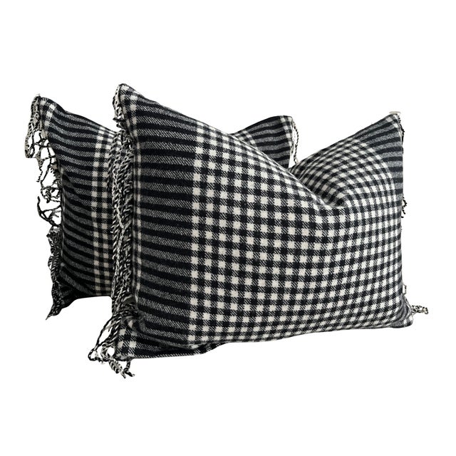 A handsome Ralph Lauren Home Fulton decorative throw pillow in a classic black and cream plaid. Crafted in 100% wool with...