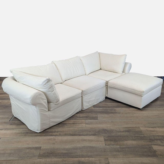 Roll Arm Slipcovered 4-Piece Sofa with Chaise Sectional with Deluxe Down Blend Wrapped Cushions in Twill Cream. Brand:...