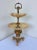 Great looking antique bronze dore mounted two tiered Alabaster stand. Beautiful for food display.