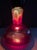 Hand blown Red Venetian Murano glass wine decanter. Ribbed details, glows a beautiful orange when light is shined through....