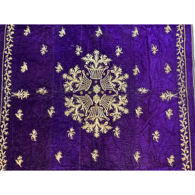 Exceptional textile made of purple color velvet, with beautiful intricate gold embroidery floral motifs, center medallion....