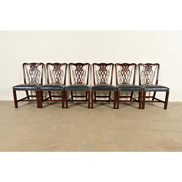 A gorgeous set of six Georgian or Chippendale style dining chairs By Councill Craftsmen USA, Circa 1980s Carved solid...