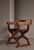A striking Danish Art Nouveau armchair in the Kurul style, handcrafted in solid oak and saddle leather, dating to the...