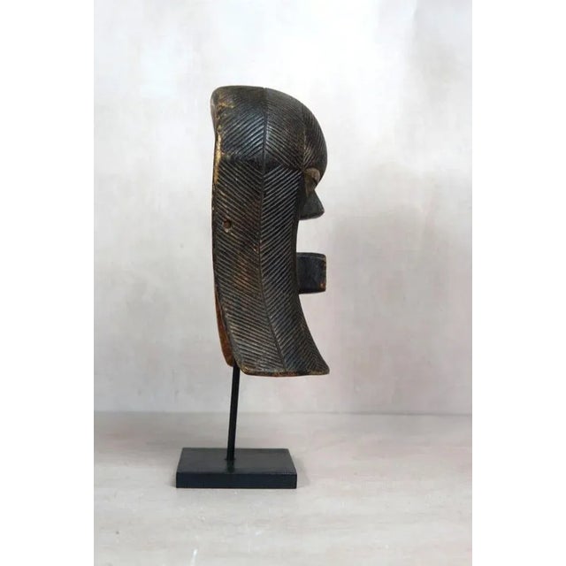 The Songye mask is an extraordinary and culturally significant art piece originating from the Songye people of the...