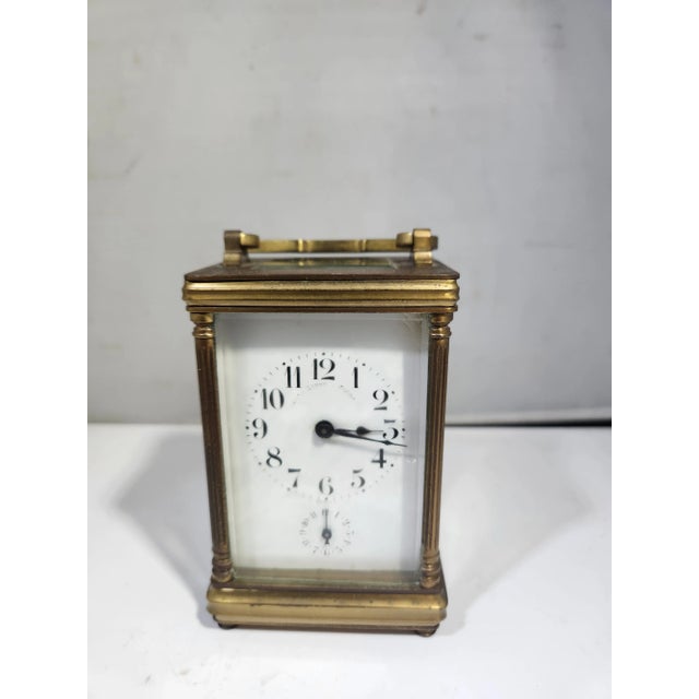 French Brass Carriage Clock W Columns recently overhauled and working sold as found in vintage condition Clock comes with...