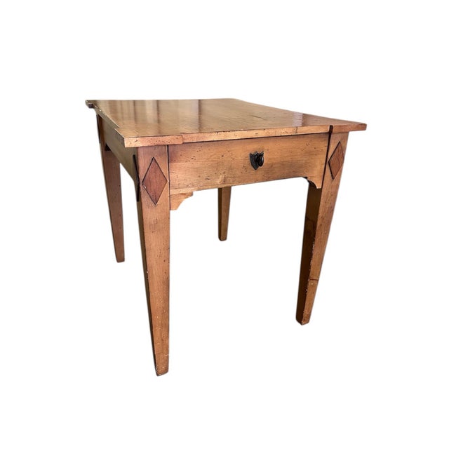 Early 19th-century American tavern or work table, dating to approximately 1820–1850. Crafted from solid hardwood, likely...