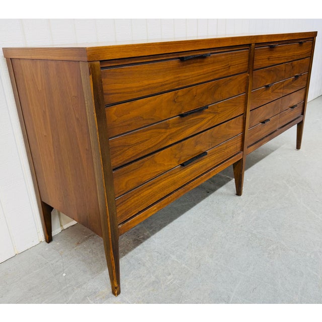 This listing is for a Mid-Century Modern Lane Tuxedo 9-Drawer Walnut Dresser. Featuring a straight line design, nine...