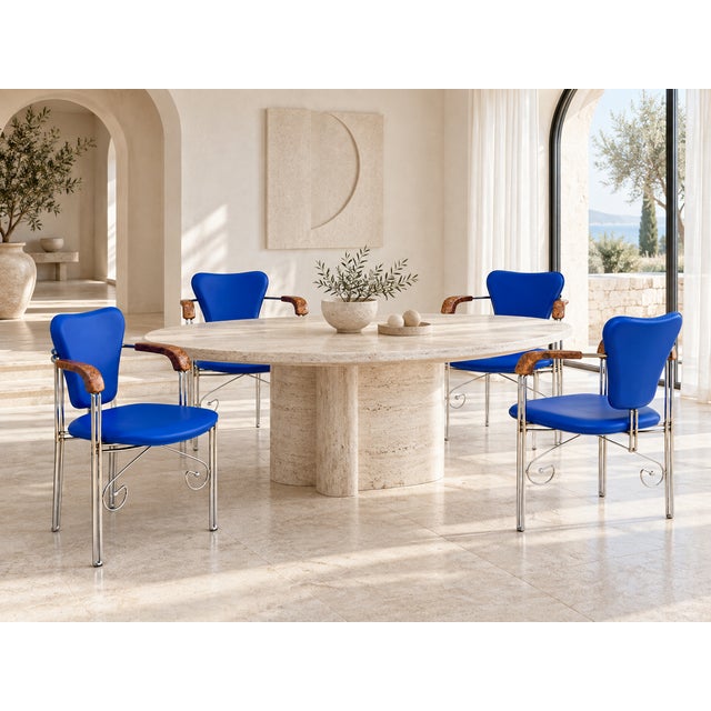Set of four vintage Italian armchairs by Arrben featuring vivid cobalt-blue leather upholstery, polished chrome tubular...