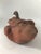 Hand crafted life size naturalistic pottery gourd sculpture with bisque exterior and dark green glazed interior. Removable...