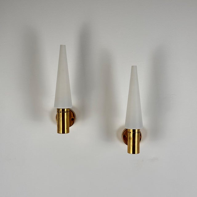 A pair of exquisite wall lights designed by the renowned Swedish designer Hans-Agne Jakobsson for his own firm in...