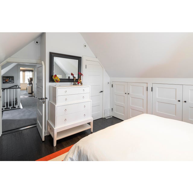 Made by Bungalow 5, The Pandora Tall 4-Drawer showcases contemporary styling with a refined white lacquered wood finish...