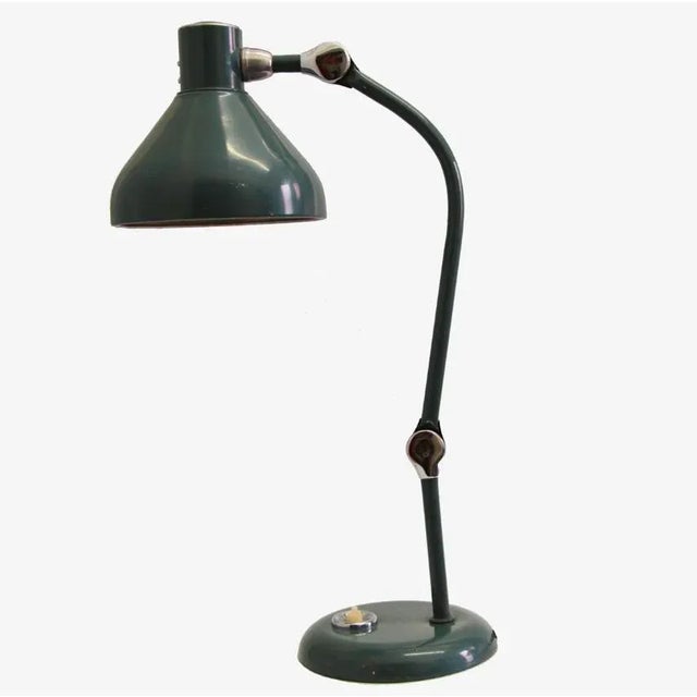 Jumo Model GS1! This art deco desk lamp was made in France by Jumo. It is made from lacquered metal and features two...