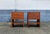 A matching pair of nightstands with two drawers and a practical shelf. They are made from fully teak veneered wood....