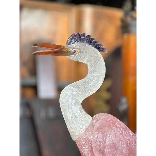 Heron bird sculpture made with rock crystal, rose quartz, agate, amethyst and metal limbs. Stands on a gorgeous amethyst...