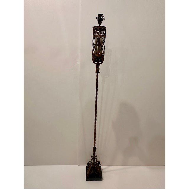 Beautiful hand wrought iron Spanish standing floor lamp having wonderful workmanship. The cluster of 5 candle lights...