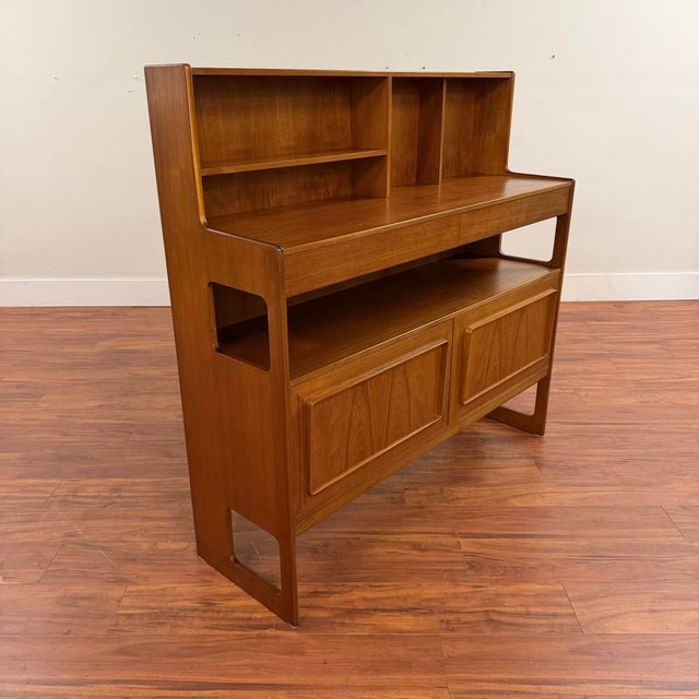 A.H. McIntosh "Fife" vintage teak double-top sideboard buffet, an interesting design that offers two surfaces for use as a...