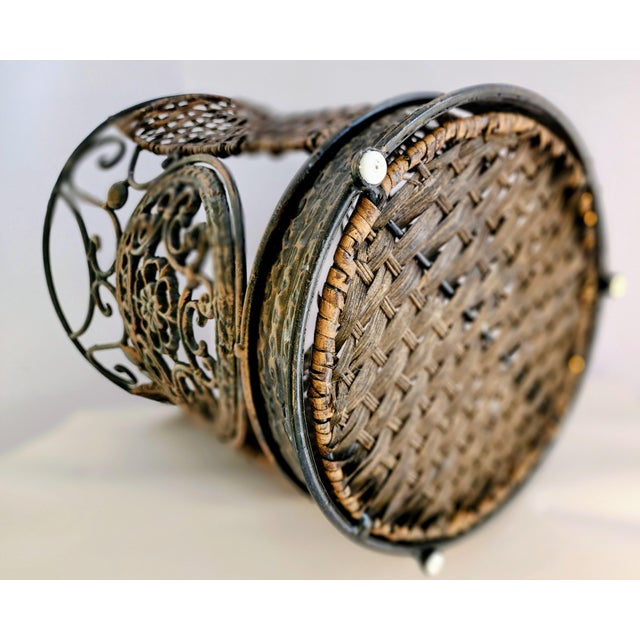 This wastebasket is a combination of elegant yet rustic. The scrolling of the wrought iron and its curvaceous lines have...