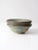A beautiful set of four vintage studio pottery bowls, each signed by the artist. Handcrafted with a striking blue and...