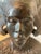 An exceptional mid-century patinated bronze or heavy cast metal sculptural bust depicting a traditional Balinese Janger...
