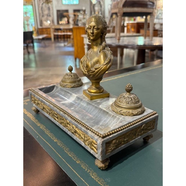 The 19th Century Napoleon III Marble and Bronze Inkwell is a luxurious collectible item that exudes elegance and...